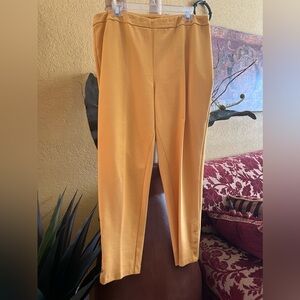 Capri pant, size large, color yellow with detail on bottom sides.